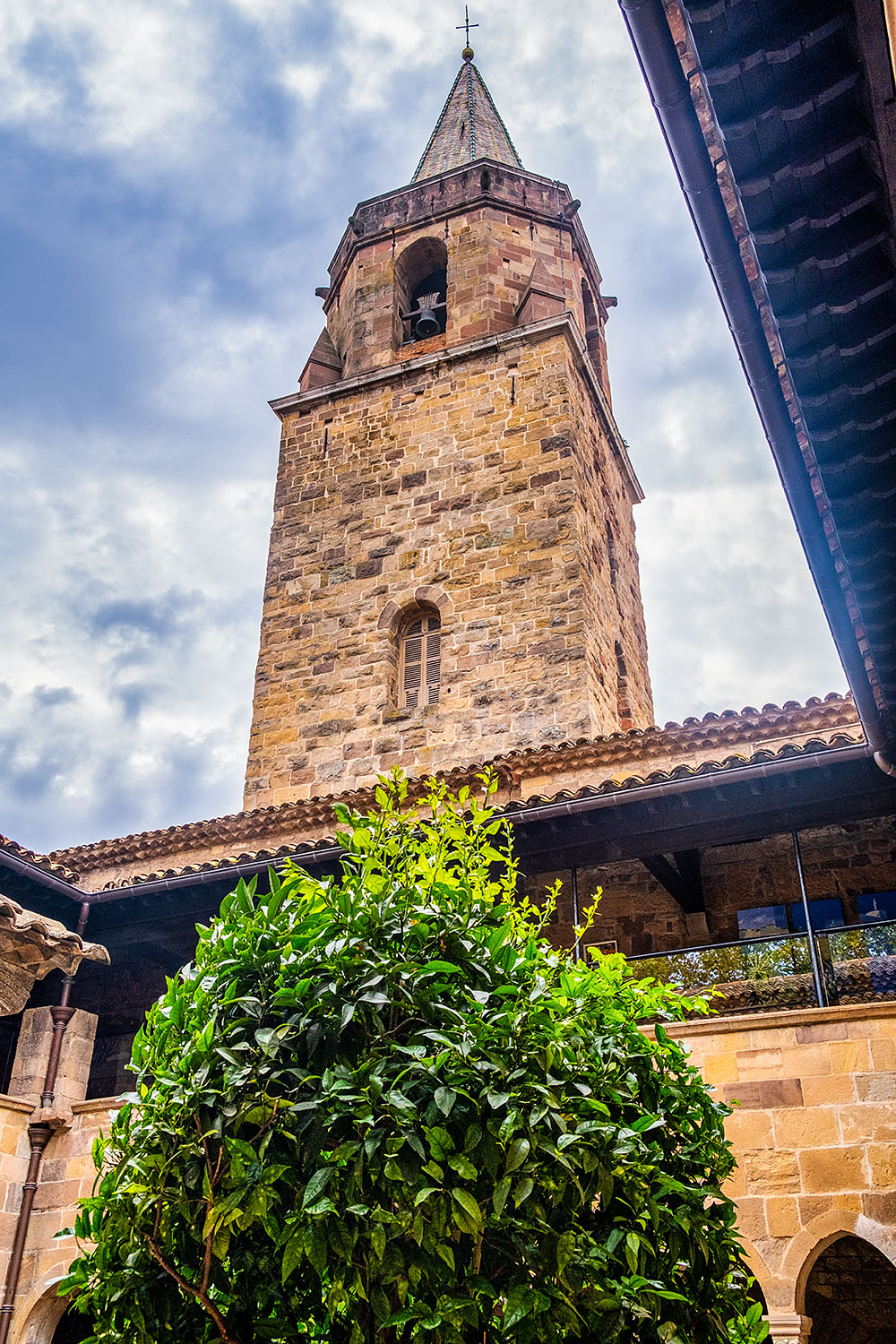 The massive belfry seen from the cloister