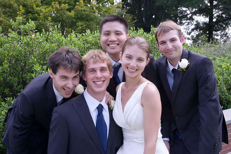 The bride with the best man and the groomsmen
