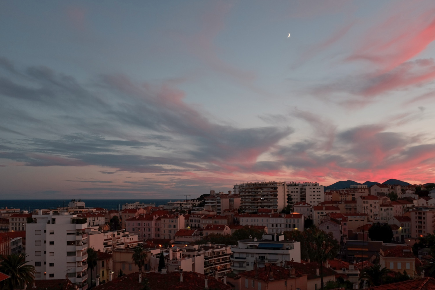 Waxing crescent moon over Cannes