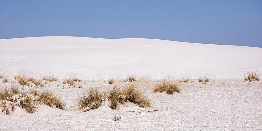 The white sand dunes look very much like snowy slopes