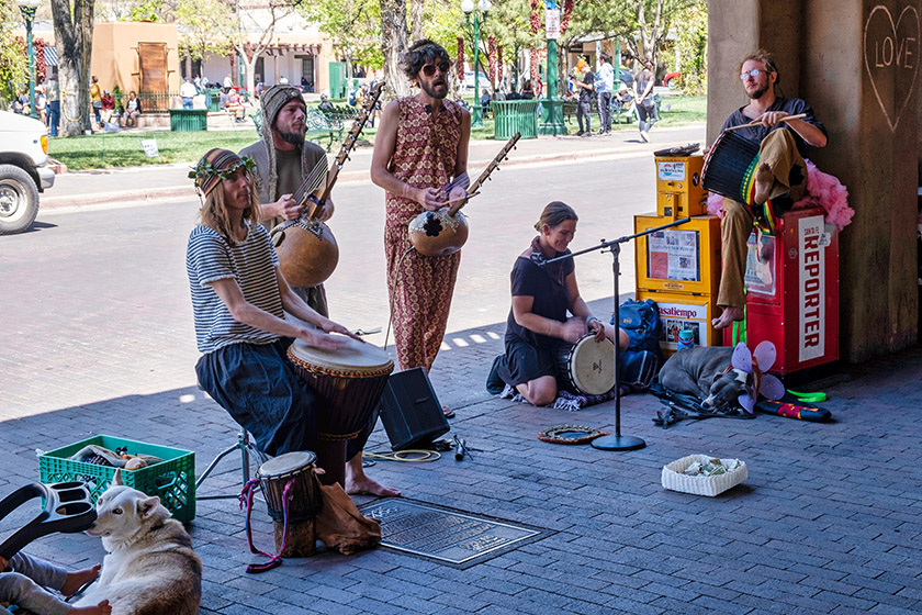 Street musicians busking by Santa Fe Plaza