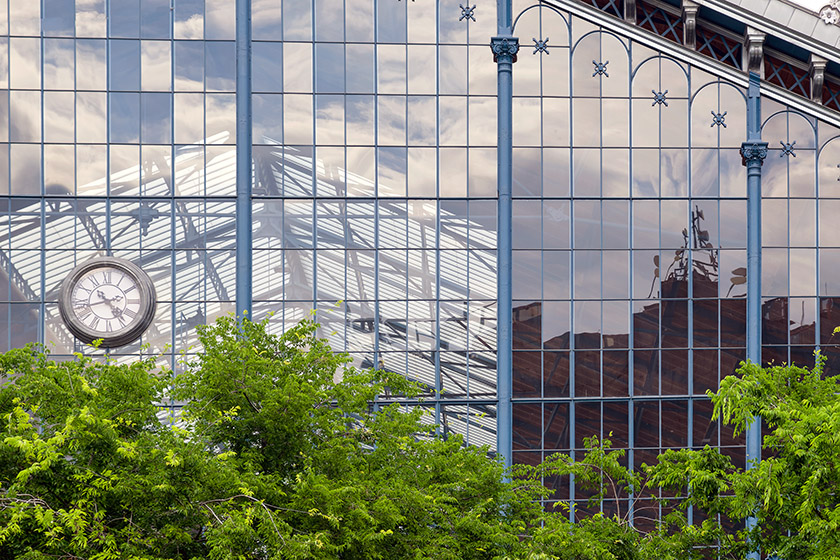 The glass façade of the train station