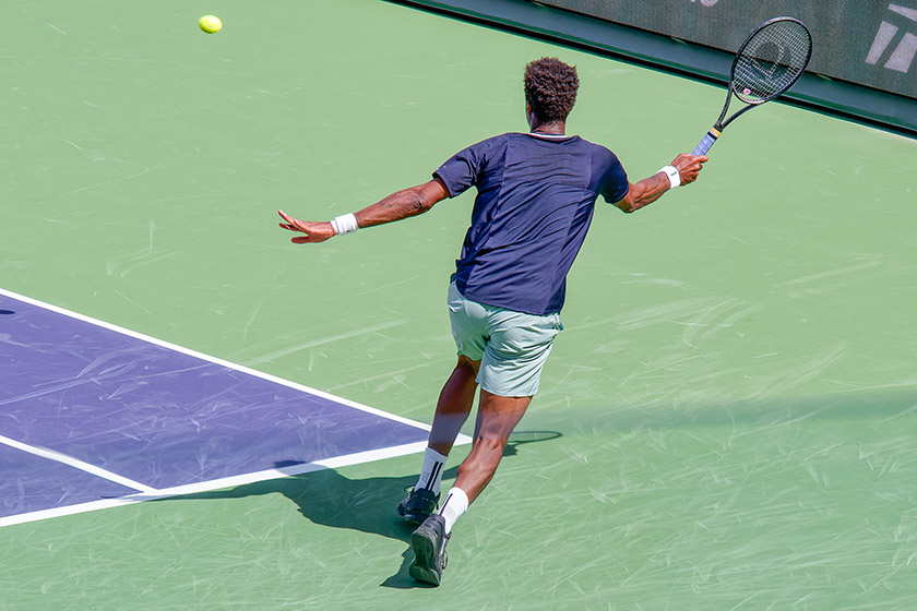 Gaël Monfils running towards the ball