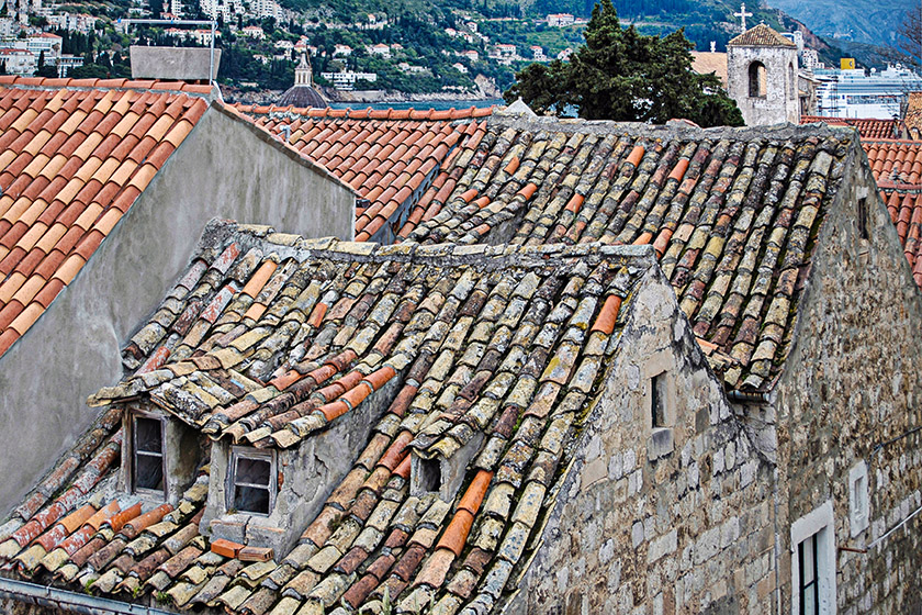 Old and new roof tiles