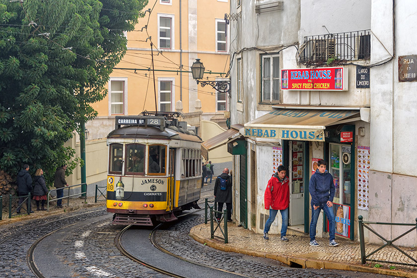 A number 28 streetcar making its way down the Rua Limoeiro